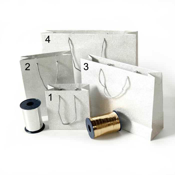 Tragetaschen "Glamour" aus Kraftpapier 180 g-qm, mit Glitterfolie silber